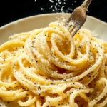 Indulge in Authentic Cacio e Pepe: A Creamy Delight First Image